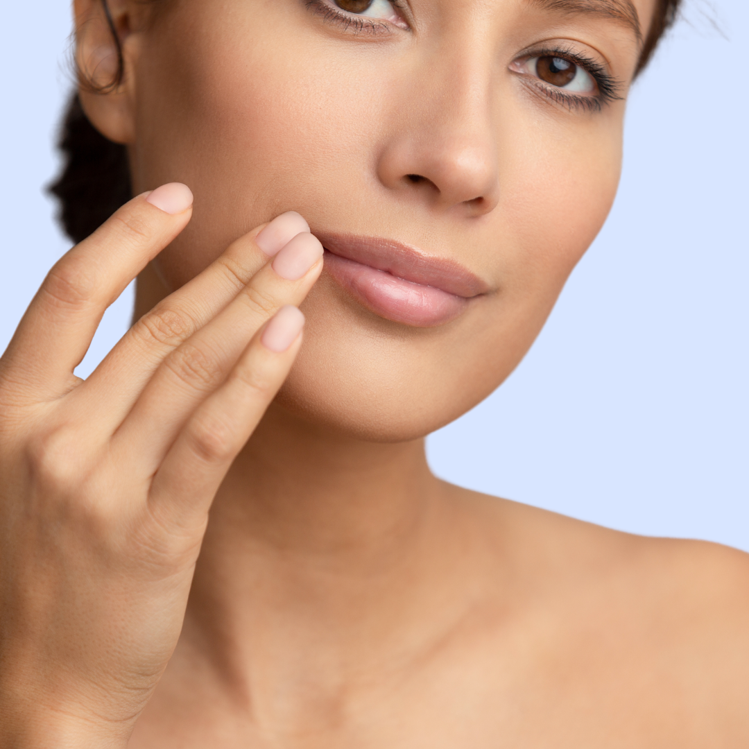 woman touching soft lips