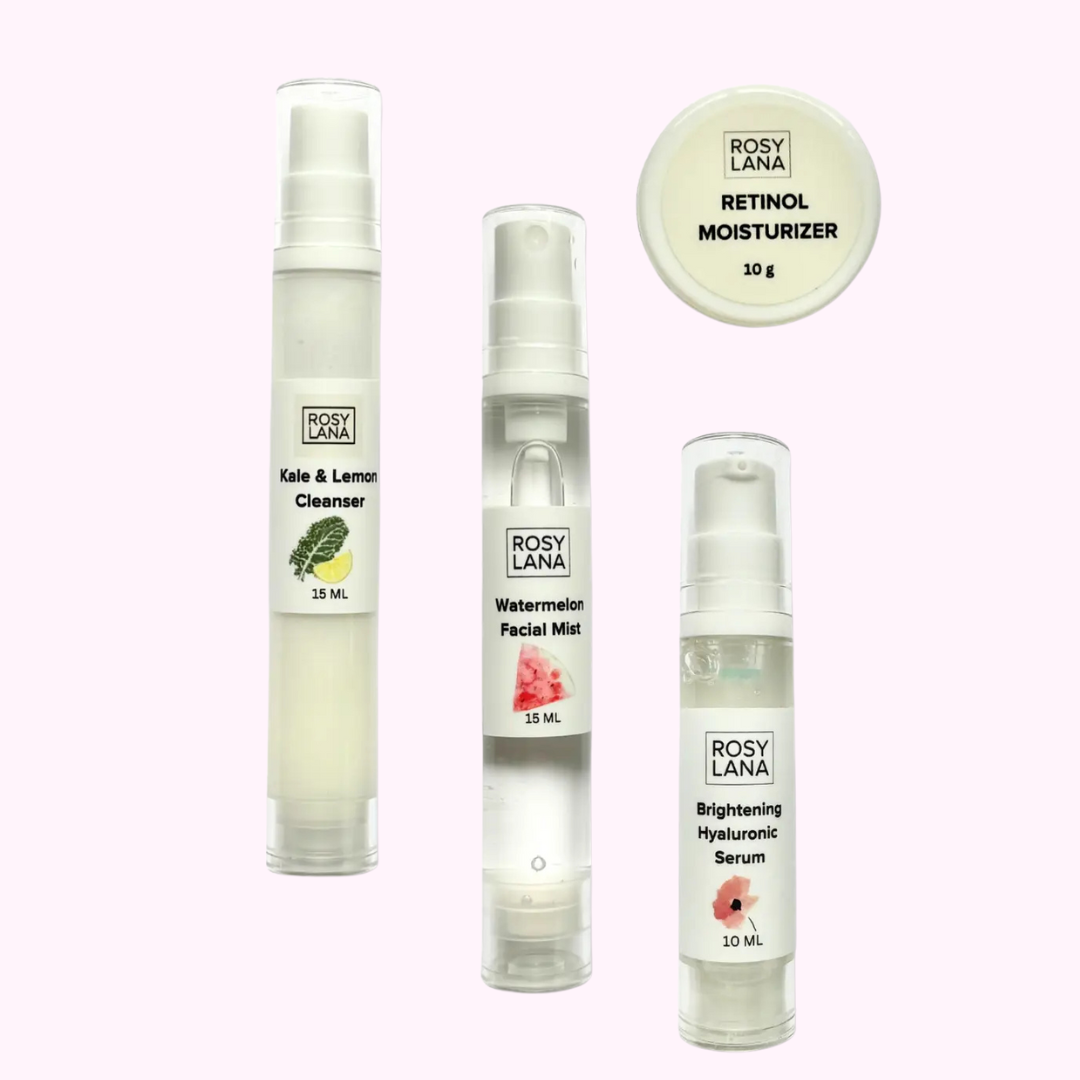 set of 4 bottles on pink background