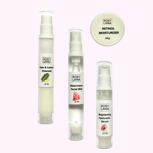 set of 4 bottles on pink background
